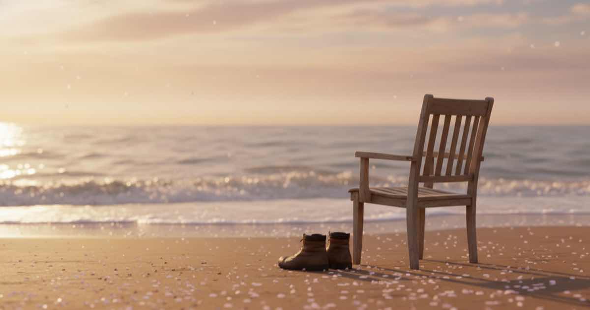 Momento contemplativo en la playa al atardecer con silla vacía